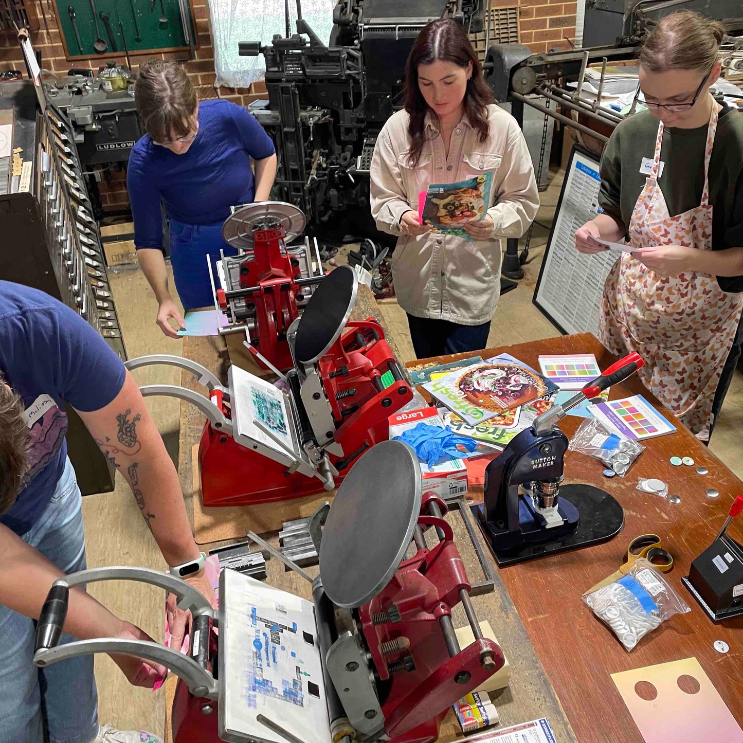 Badge making using Adana presses in Wayzgoose 2024.