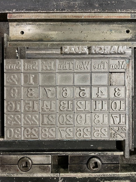 Metal type for the calendar month of March