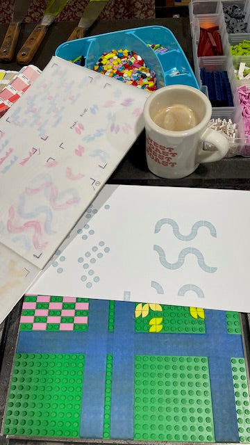 Work in progress of the process from the draft artwork to the positioning of the lego tiles on the base plate and what it looks like printed.