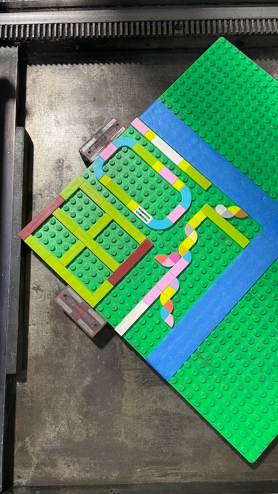 Close up of the lego tile design for "Foo"